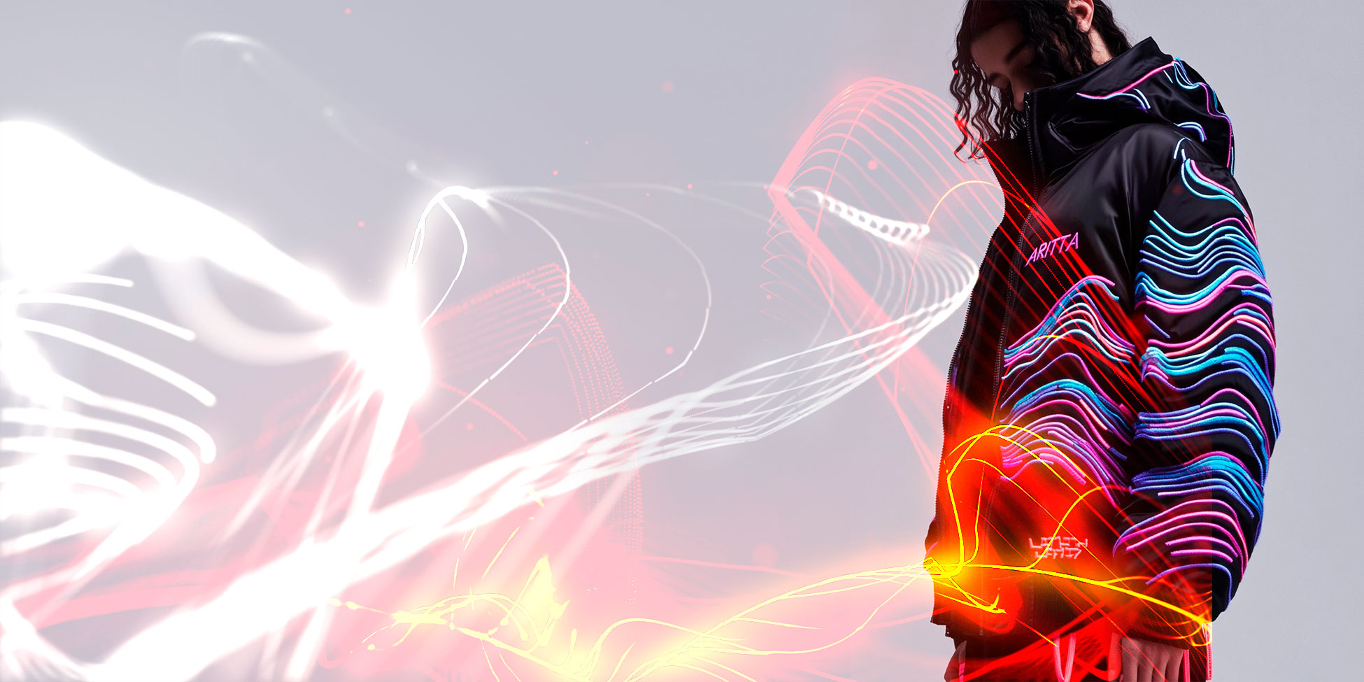 Model wearing the Midnight Frequency jacket surrounded by luminous trails